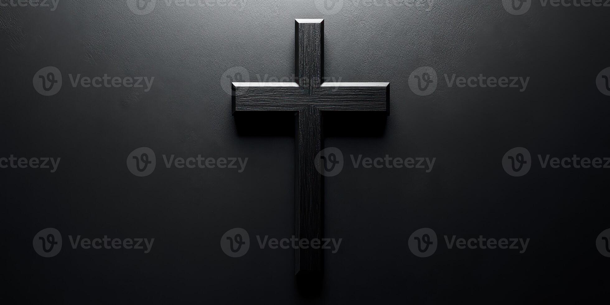 Elegant black wooden cross displayed against a dark background highlighting its simple beauty and significance in spirituality photo