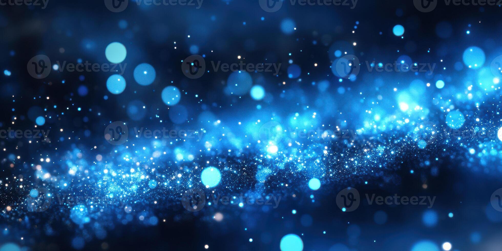 Vibrant blue particles create a mesmerizing cosmic effect in a digital art display photo