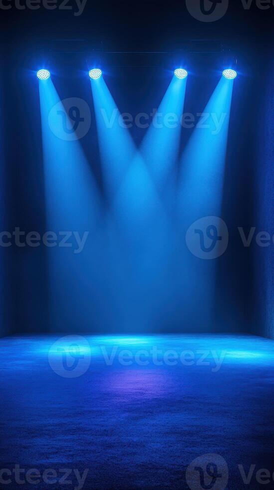 Spotlights shine down on an empty stage creating a vibrant atmosphere for an upcoming performance photo