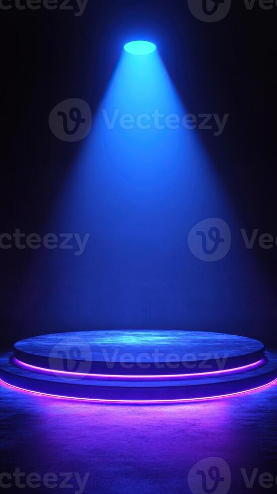 Spotlight illuminates a circular stage design with blue and purple lighting in a darkened venue photo