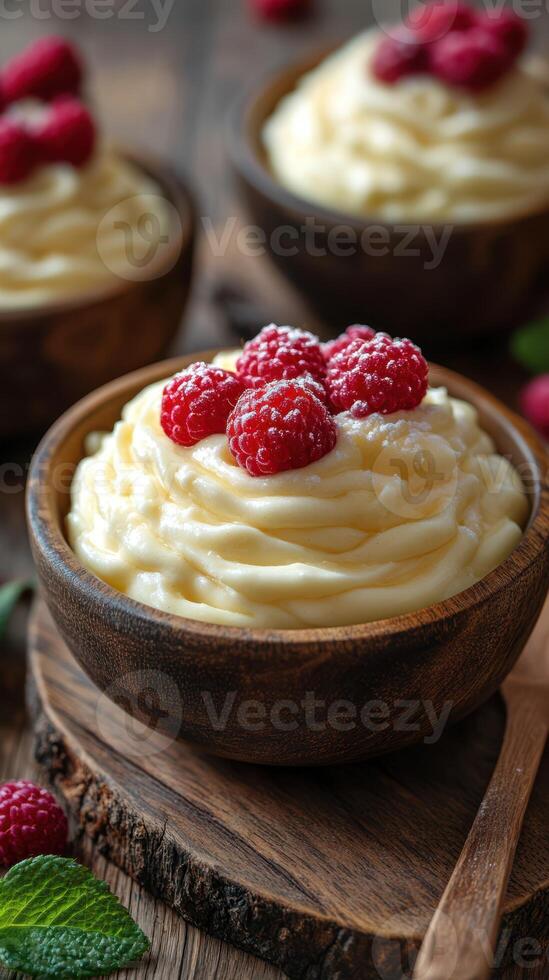 Delicious dessert with whipped cream and fresh raspberries served in wooden bowls at a rustic table setting photo