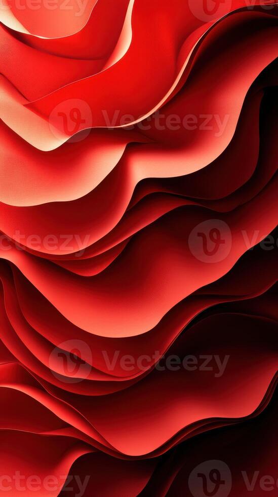 Red fabric waves create a dynamic and flowing pattern in a textural display of movement and color photo