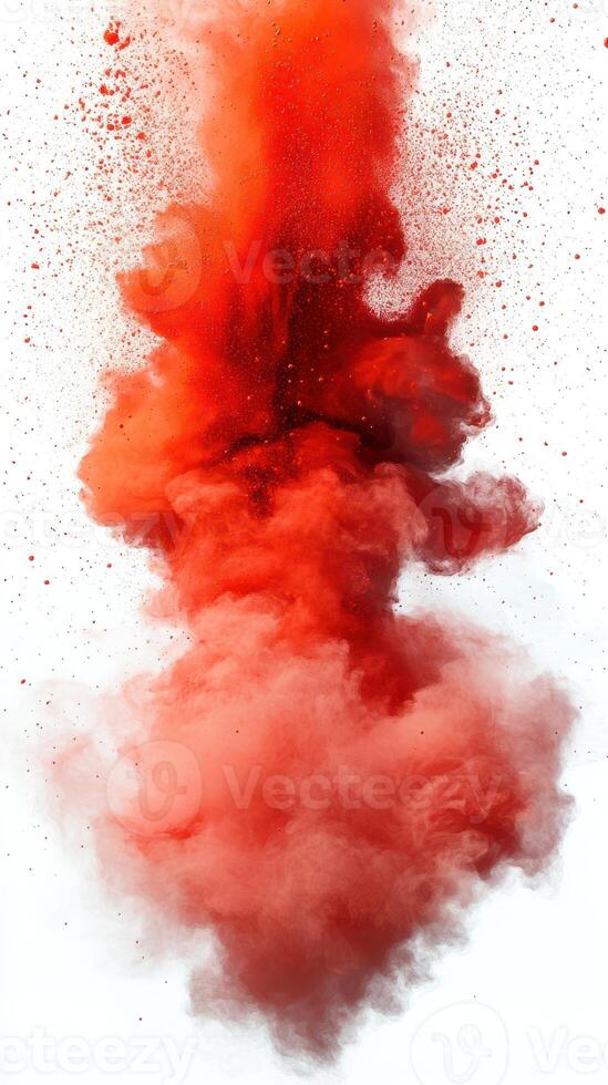 Vivid red powder explosion creating a dramatic visual effect in a controlled environment photo