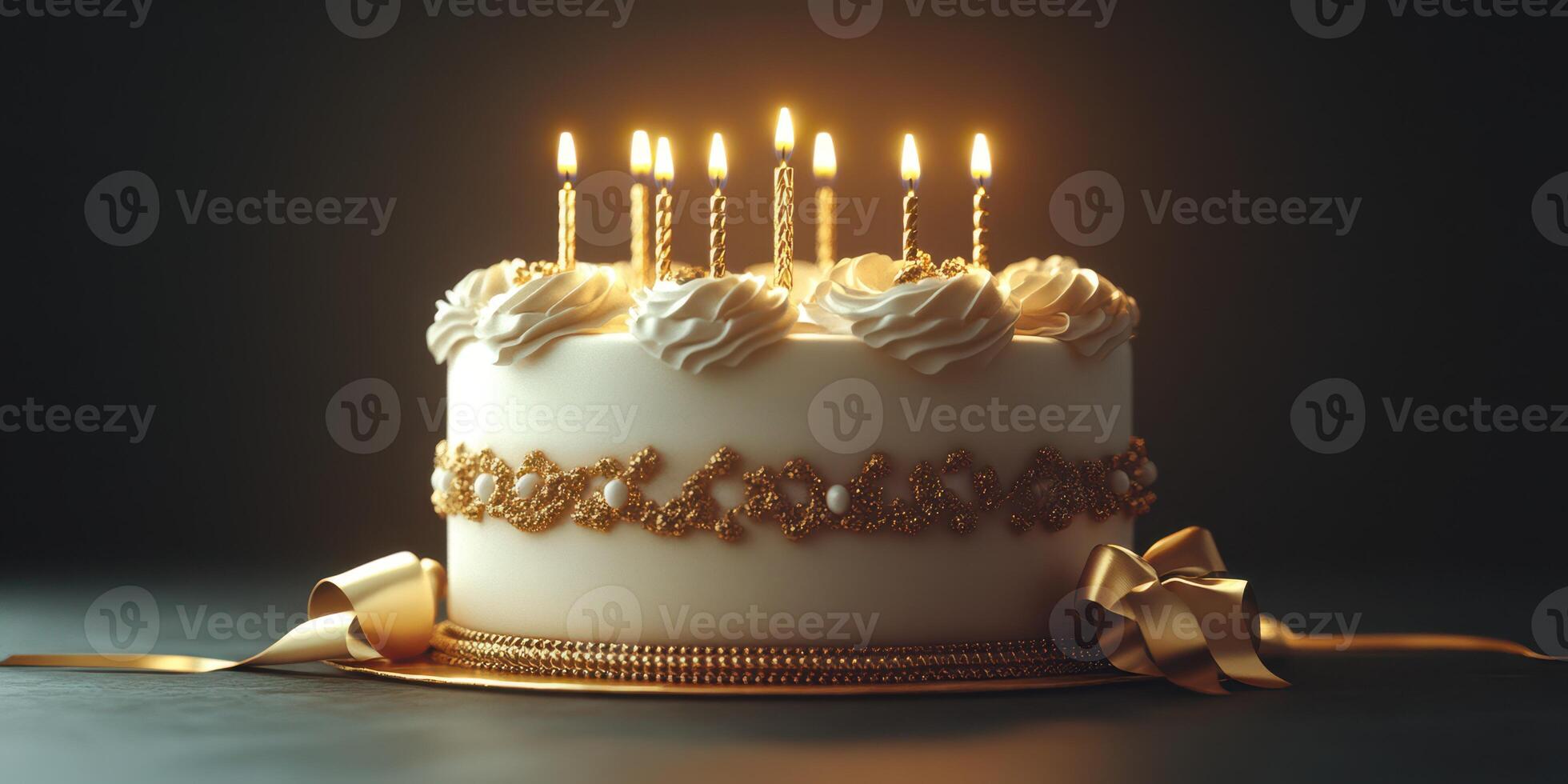 Celebration with a beautifully decorated cake featuring lit candles and elegant golden embellishments in a dark setting photo