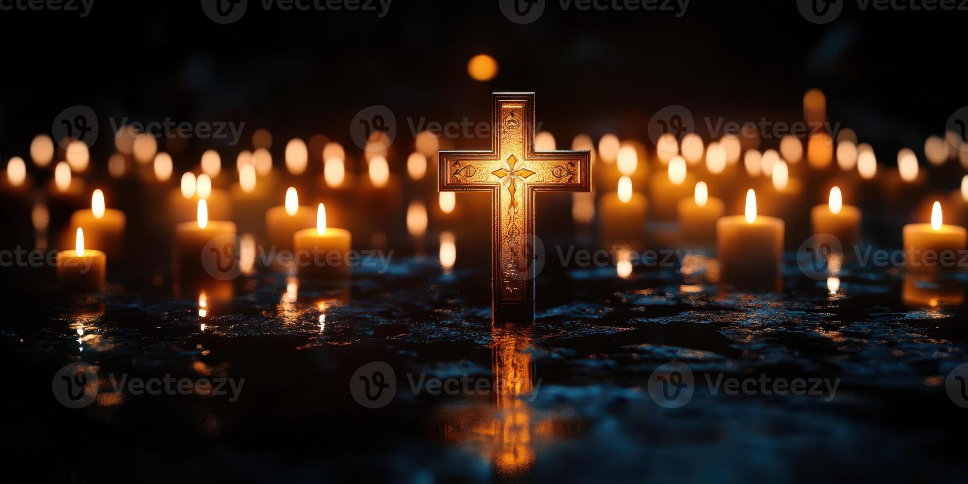 Candles illuminated around a gold cross in a dark setting during a night vigil photo