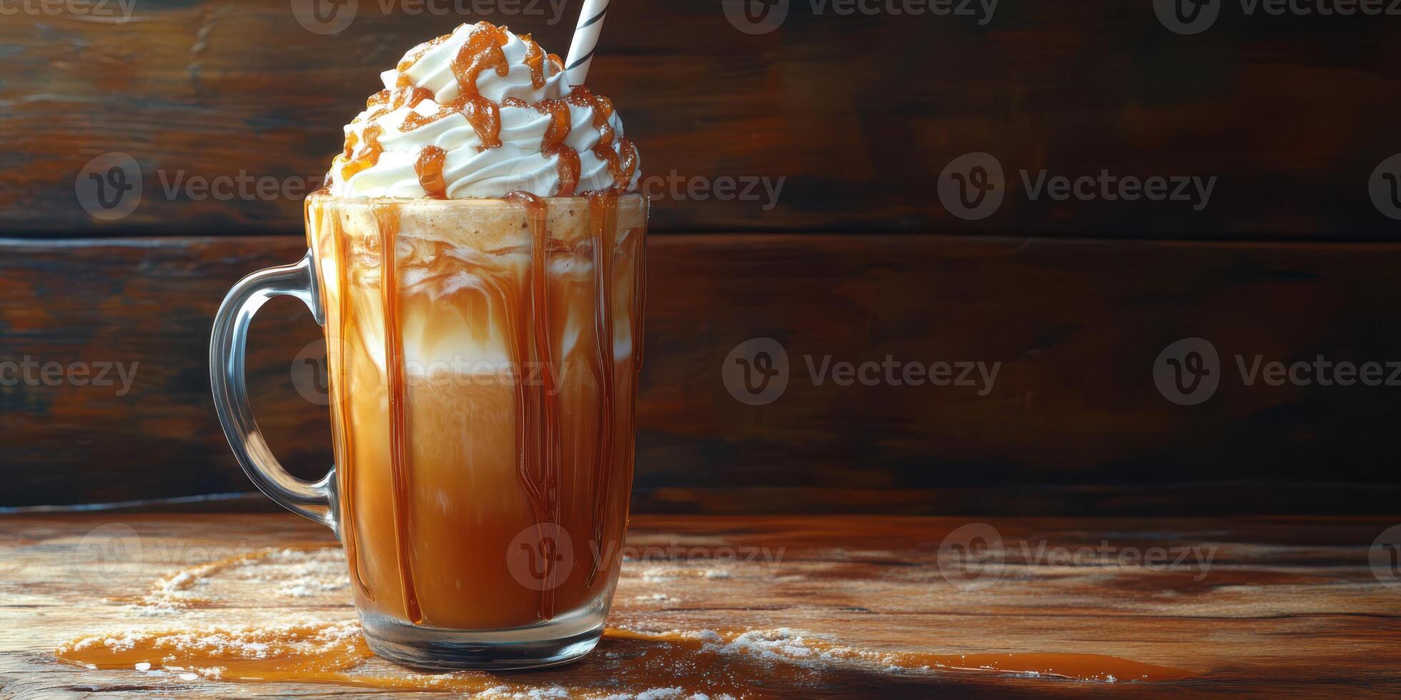 Delicious caramel topped iced drink in a glass mug against a rustic wooden background photo