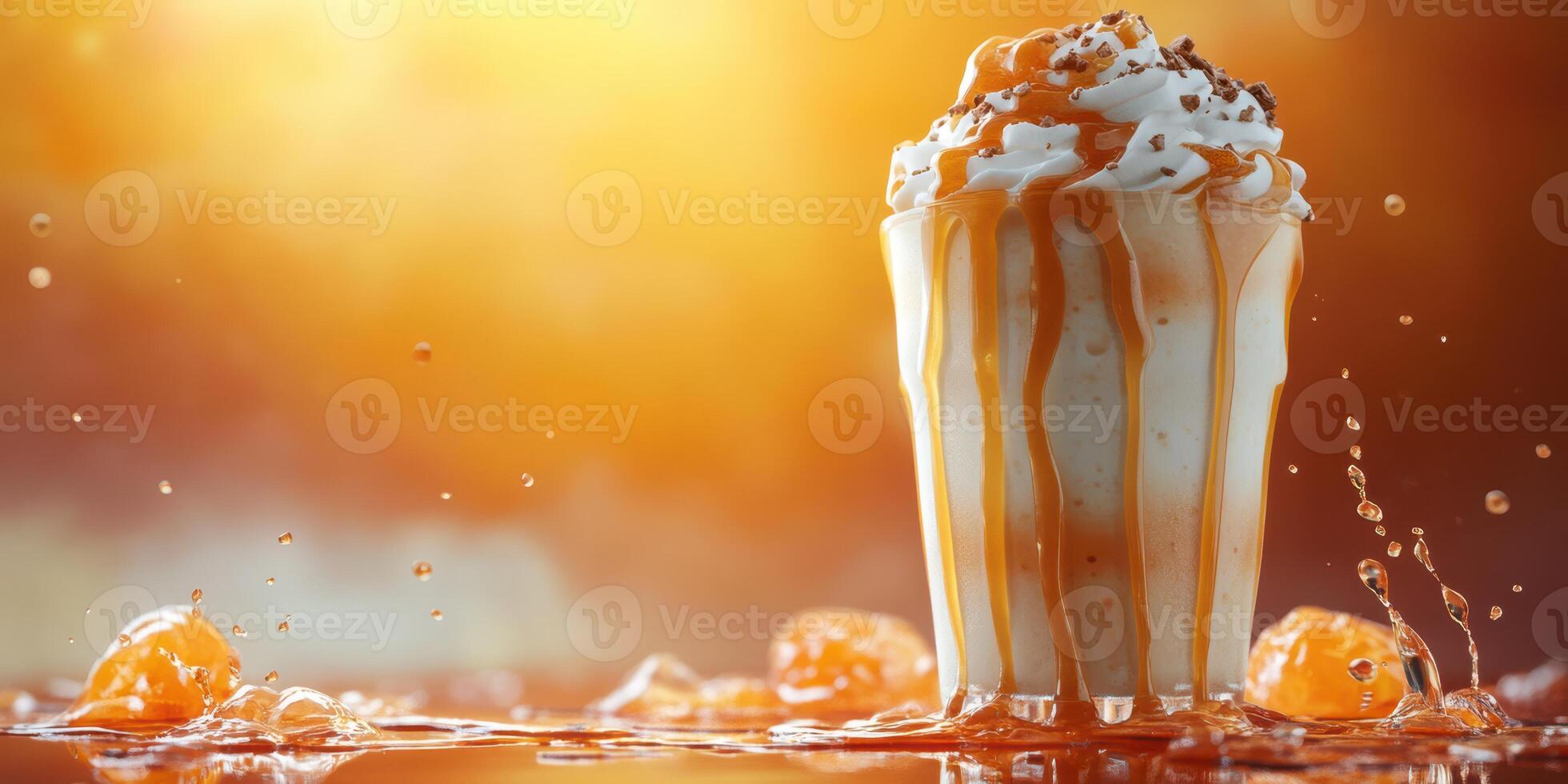 Creamy dessert drink with caramel drizzle and splashes in warm sunlight during summer afternoons photo