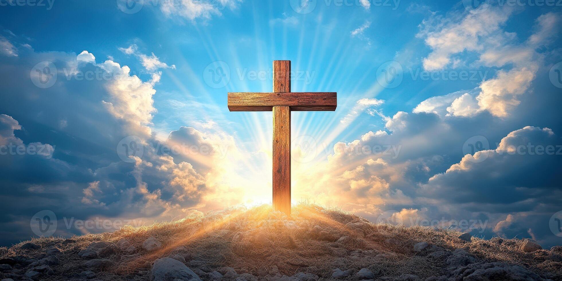 Wooden cross on a hilltop with radiant sunbeams shining through clouds at dawn photo