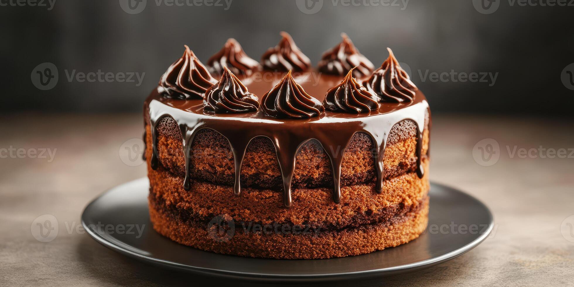 Decadent chocolate cake adorned with creamy swirls and dripping ganache on a sleek black plate photo