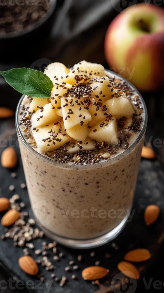 Healthy apple chia pudding topped with fresh fruit and nuts in a cozy setting photo