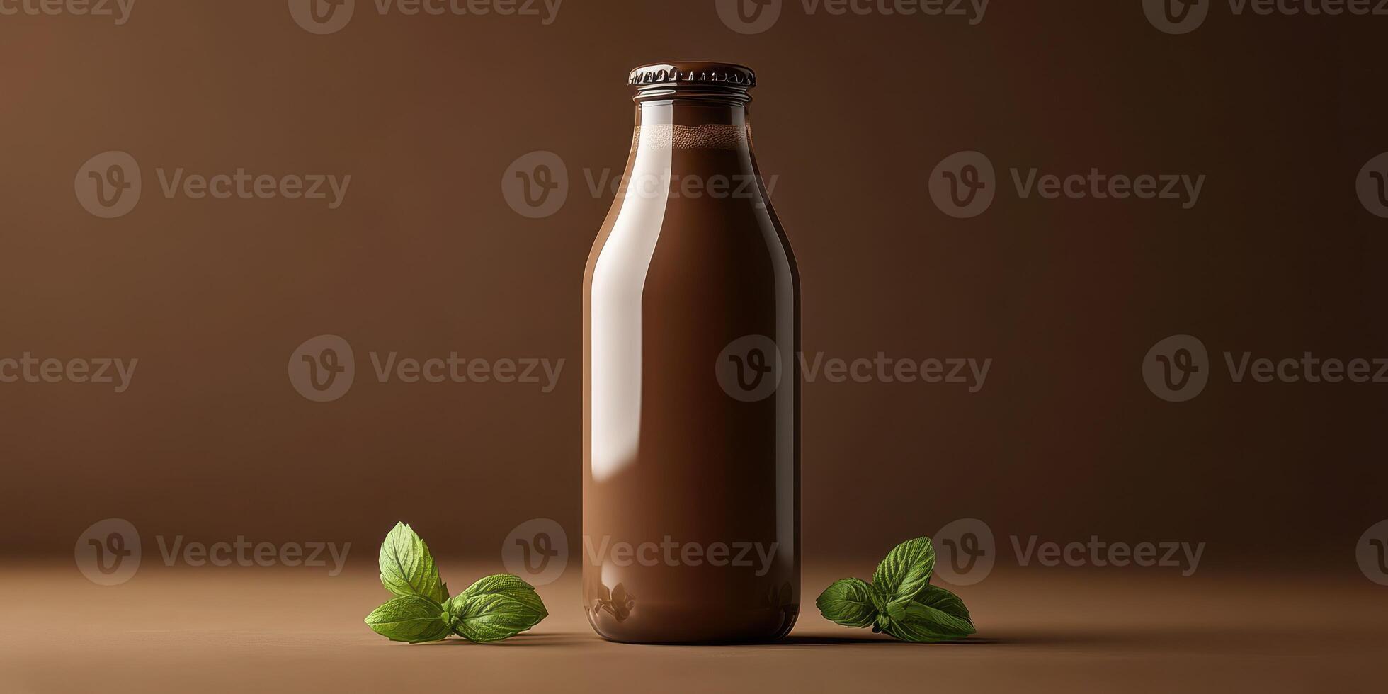 Glass bottle filled with creamy chocolate drink and fresh mint leaves on a brown surface photo