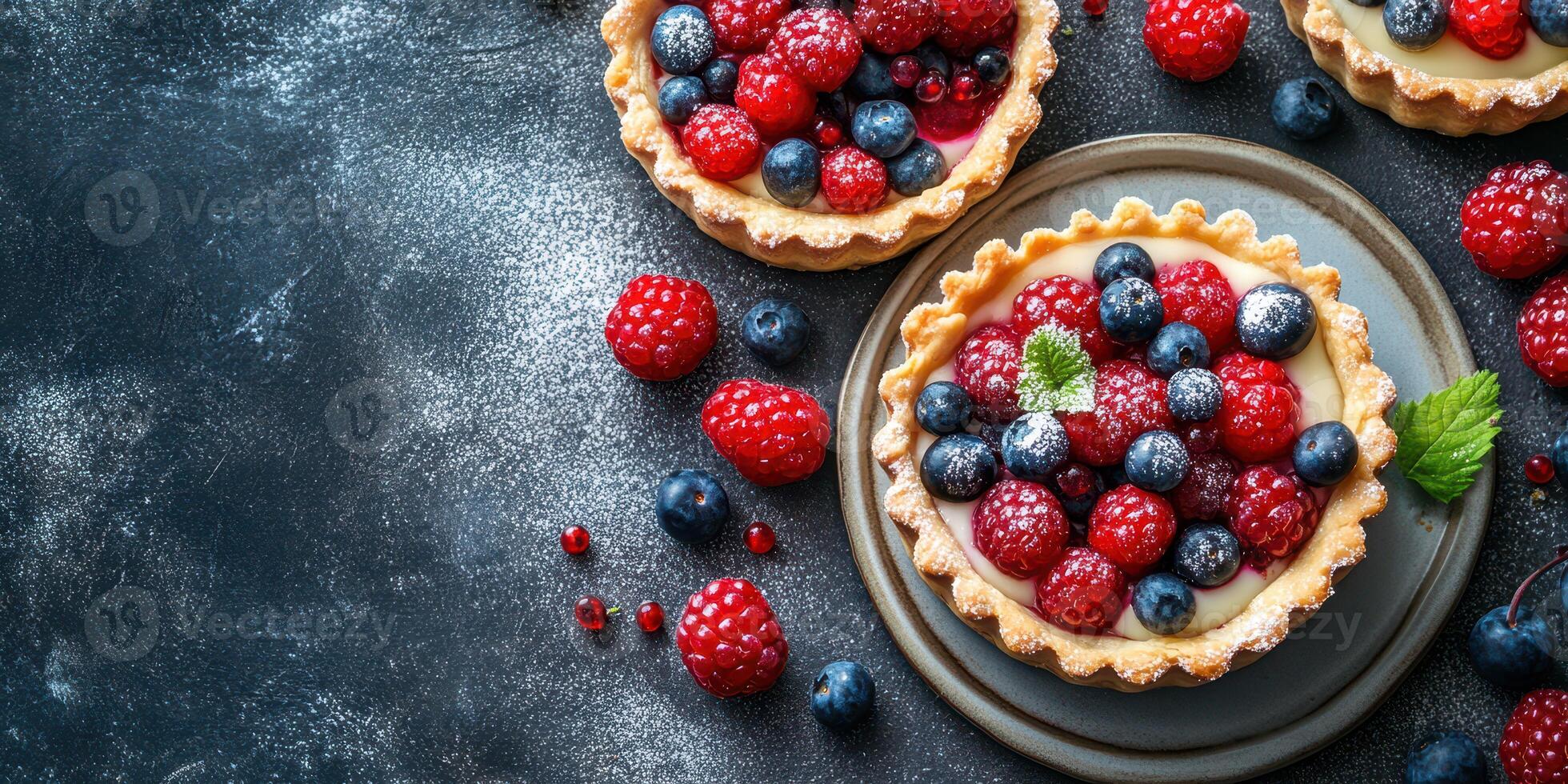 Delicious berry tarts arranged on a rustic table with vibrant colors and textures highlighting the fresh ingredients photo