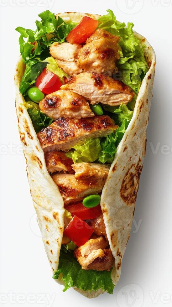 Grilled chicken wrap loaded with fresh vegetables showcased on a clean background photo