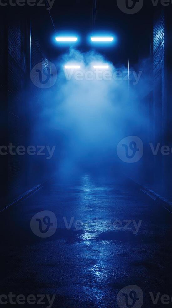 Dark alley illuminated by blue neon lights creating a mysterious atmosphere in an urban setting at nighttime photo