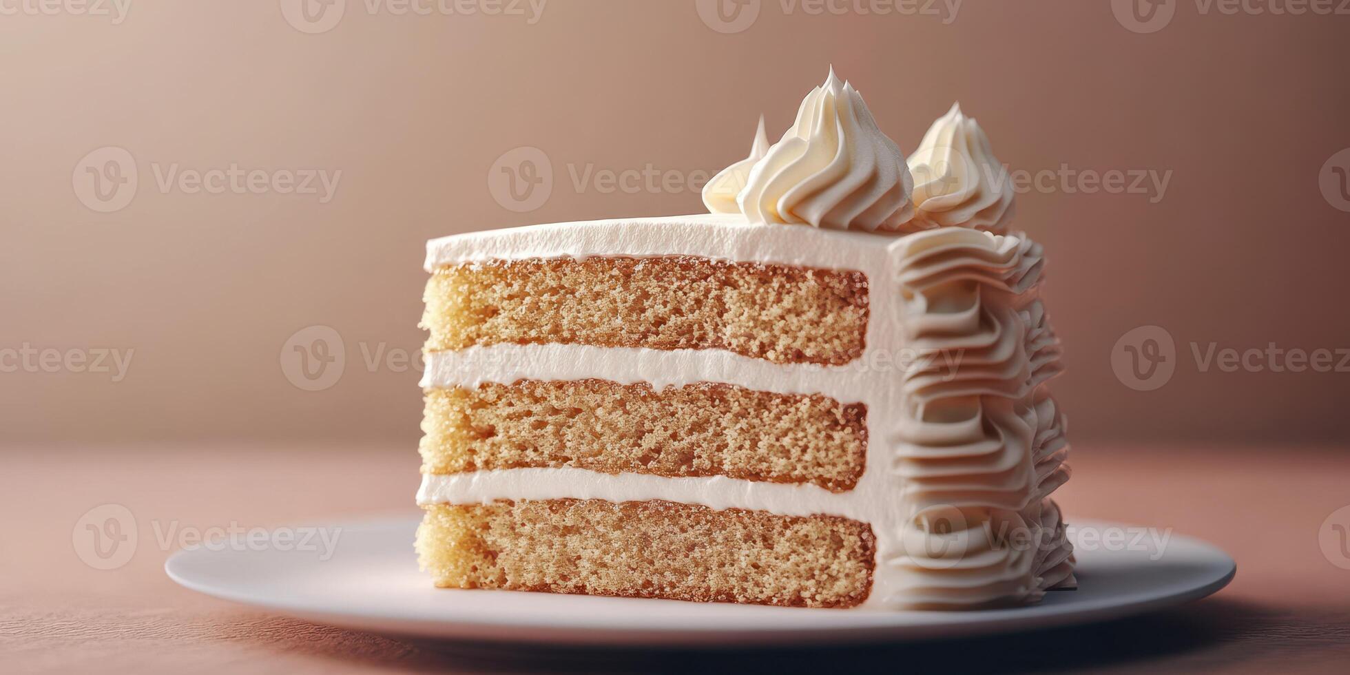 Delicious layered vanilla cake with cream frosting displayed on a white plate in a cozy setting photo