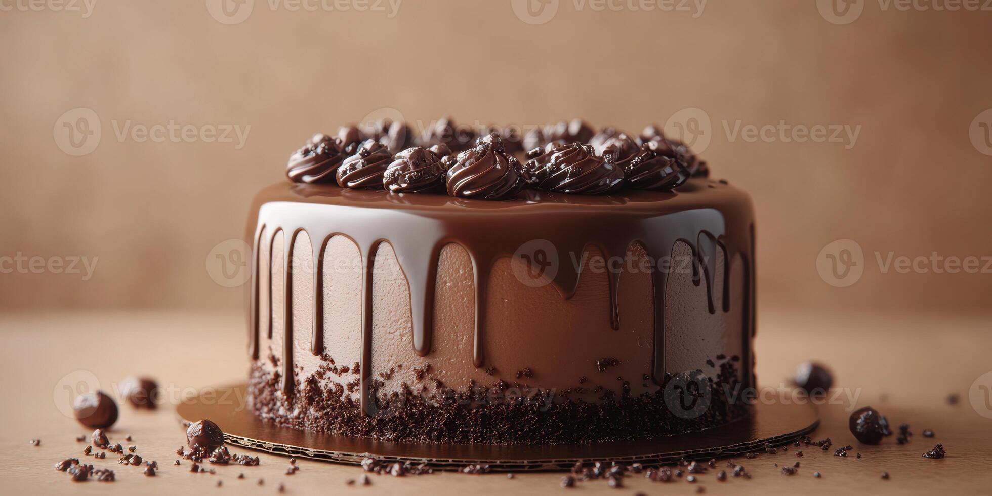 Chocolate cake topped with ganache and chocolate truffles on a wooden table in soft lighting photo