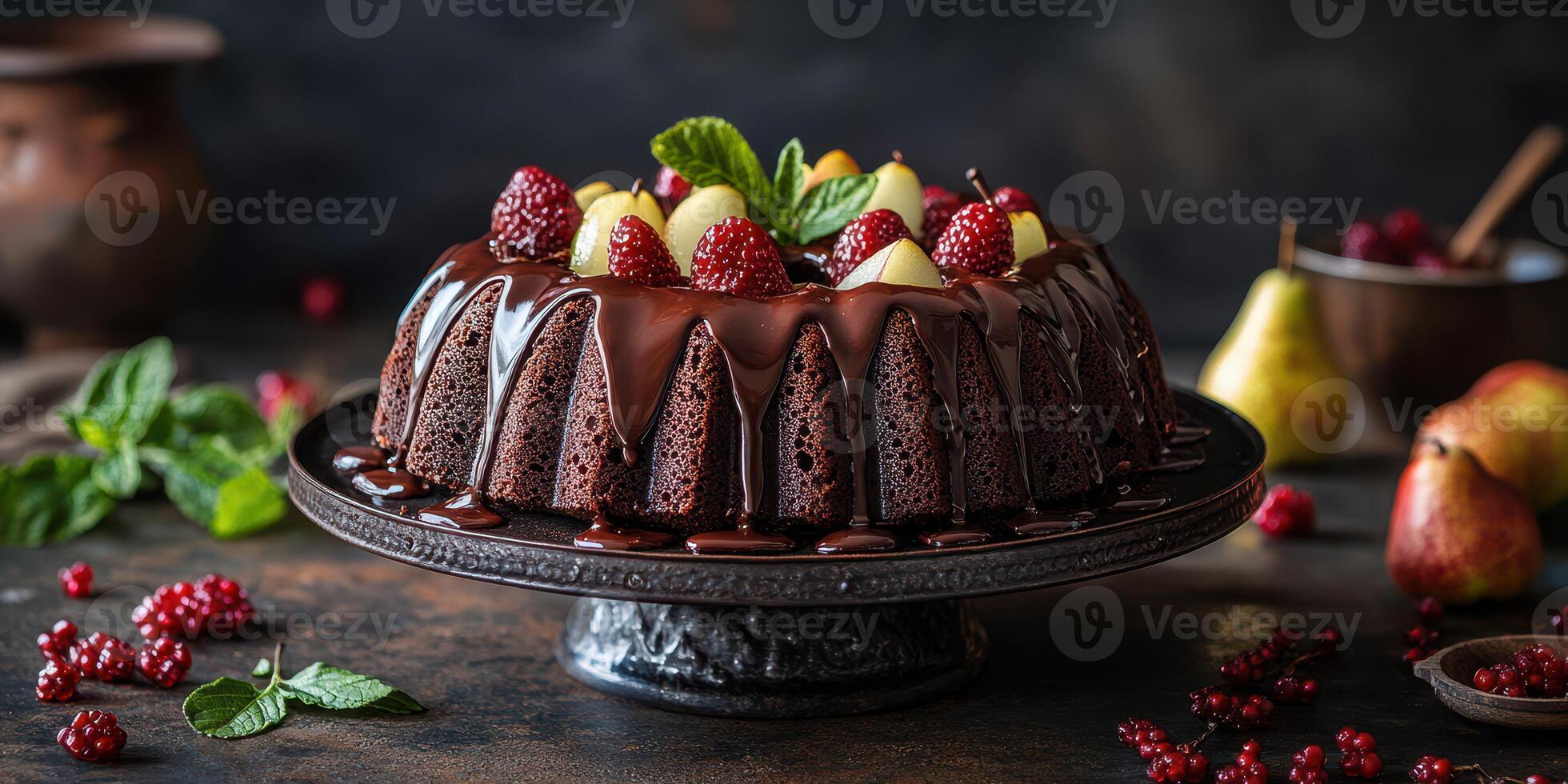 Delicious chocolate cake adorned with fresh raspberries and pears displayed on an elegant platter in a dark setting photo