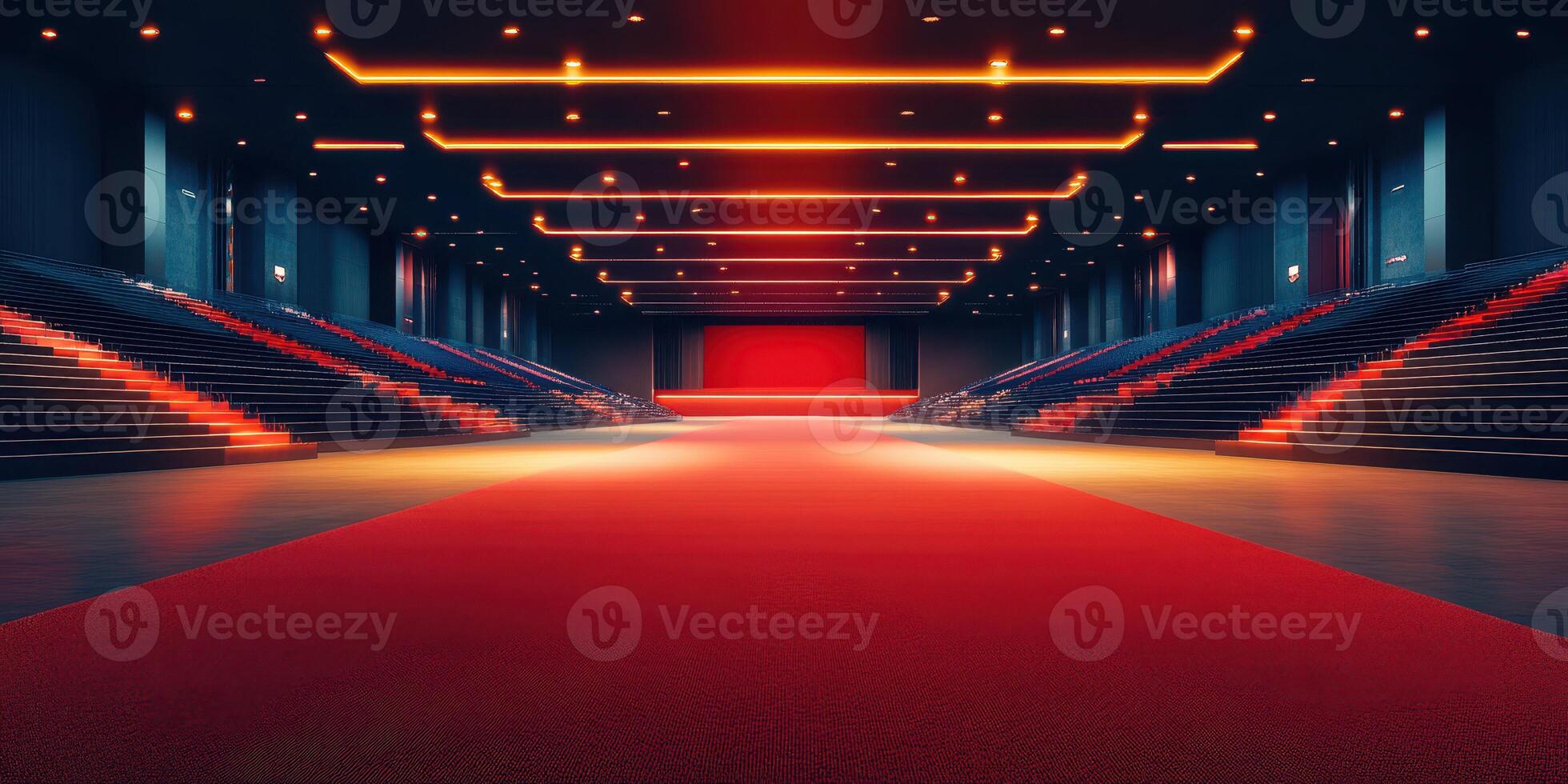 Modern concert hall featuring red carpet and illuminated seating in a spacious venue photo