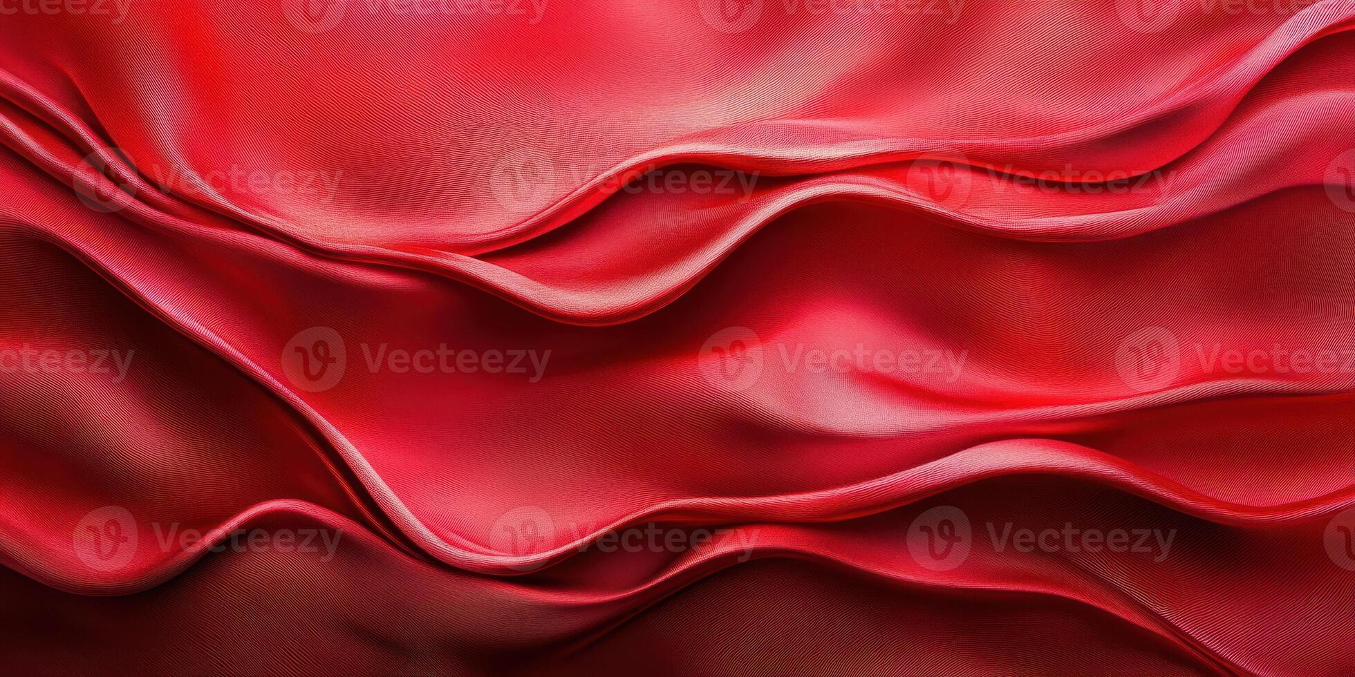 Silky red fabric with elegant folds and curves in soft lighting creating a luxurious appearance photo