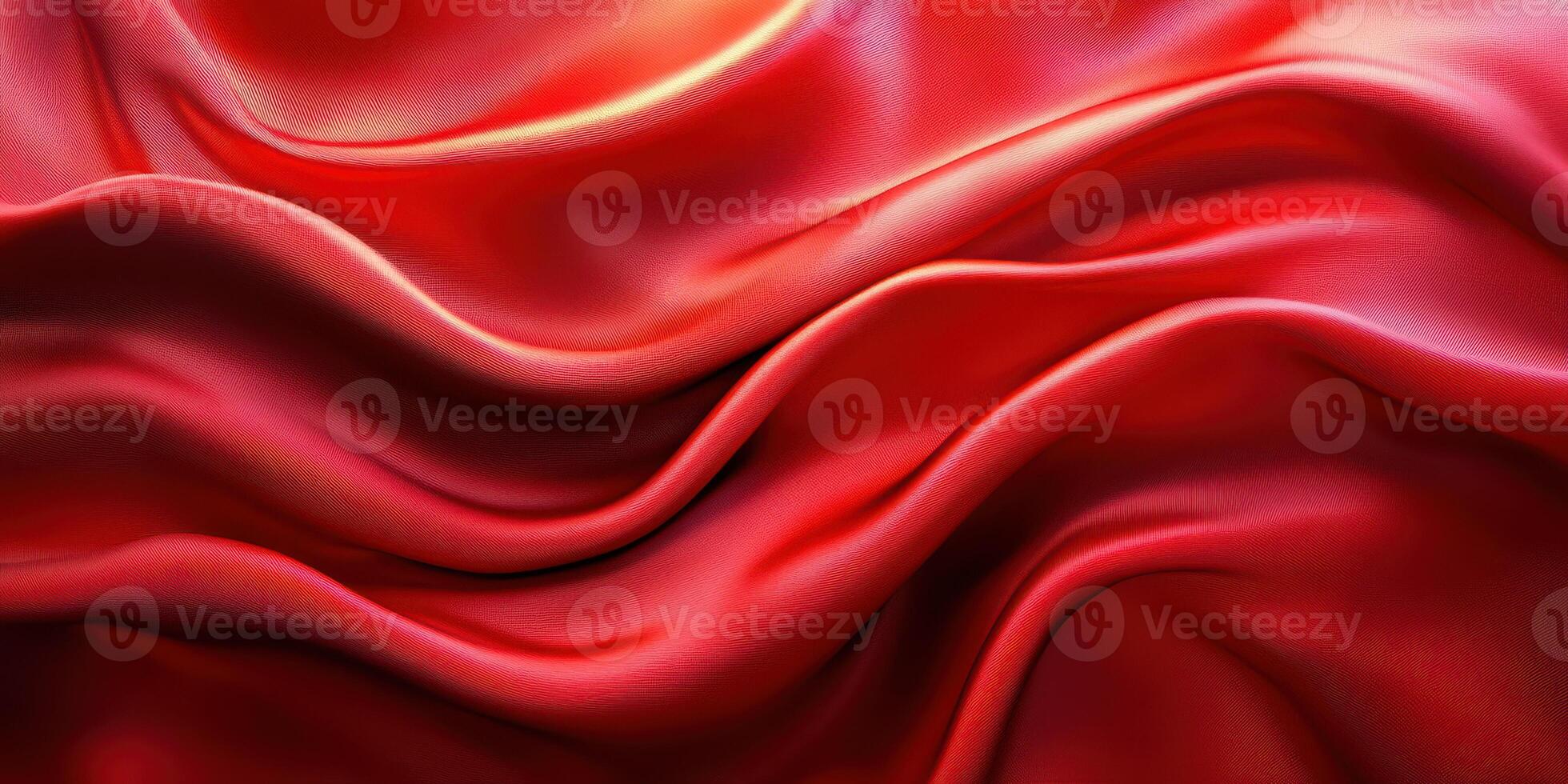 Elegant red satin fabric flowing smoothly with soft, graceful folds and curves under warm lighting photo