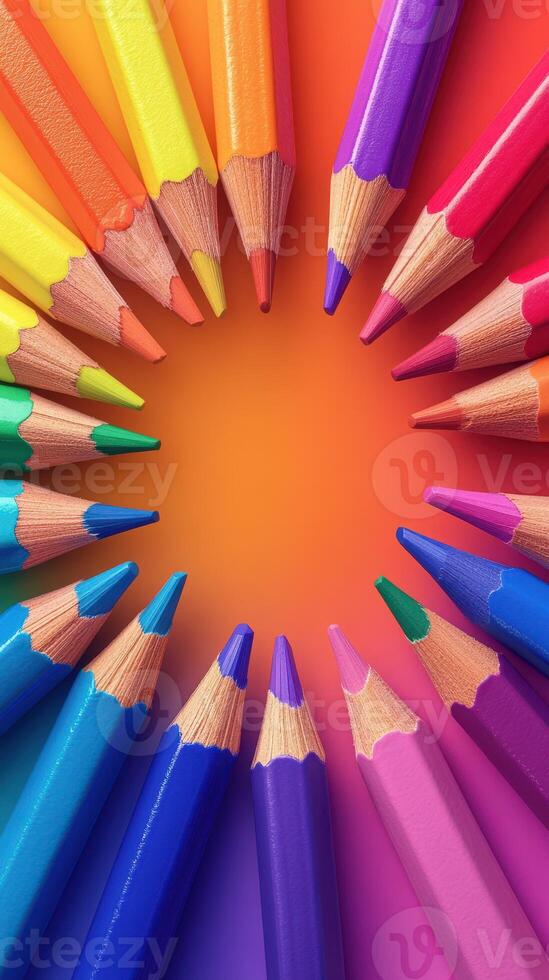 Colorful arrangement of crayons creates a vibrant circle on a bright background photo