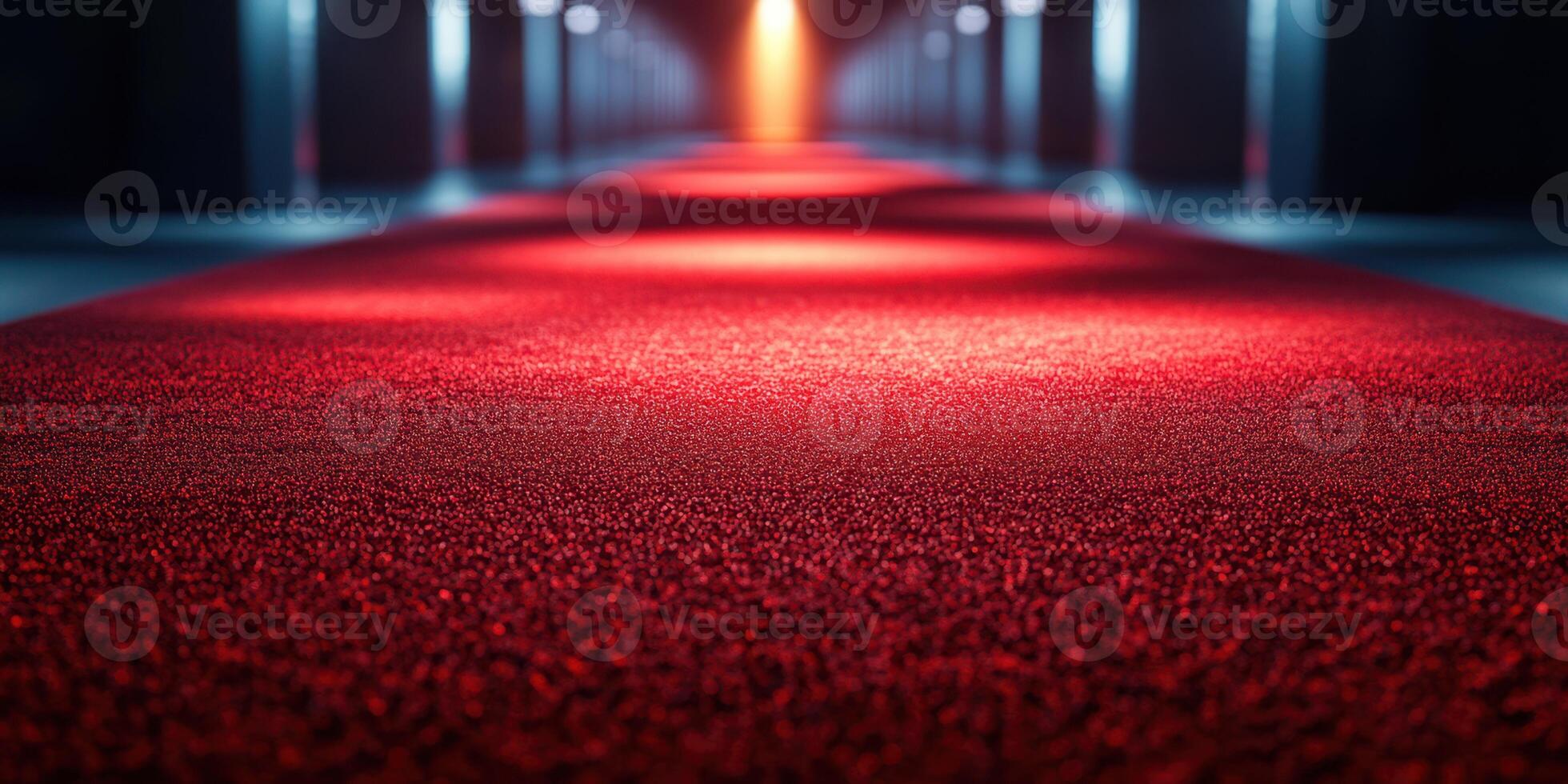 Red carpet leading to illuminated hallway in a modern venue during evening event photo