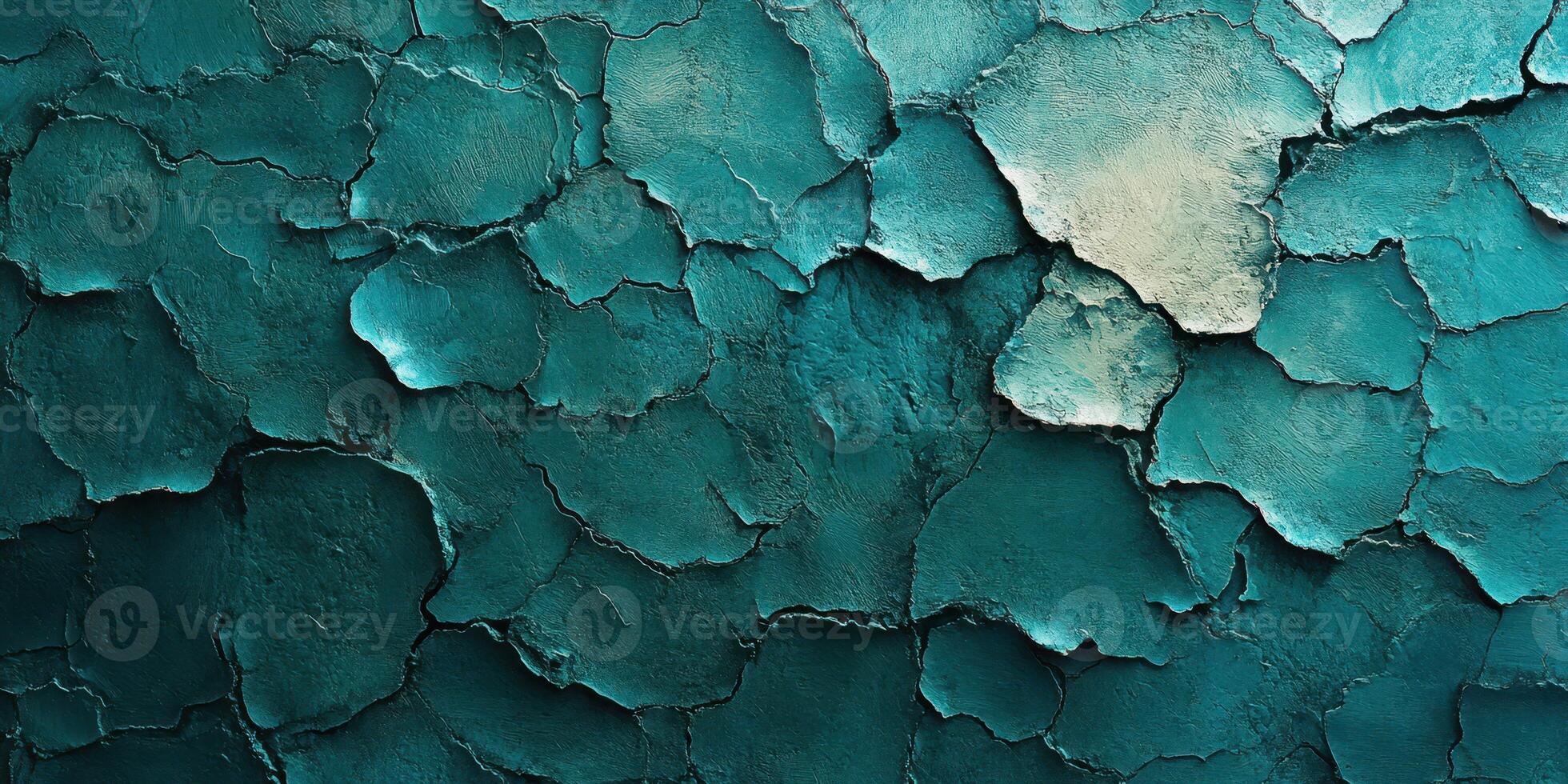 Cracked turquoise paint texture revealing layers beneath in a worn surface background photo