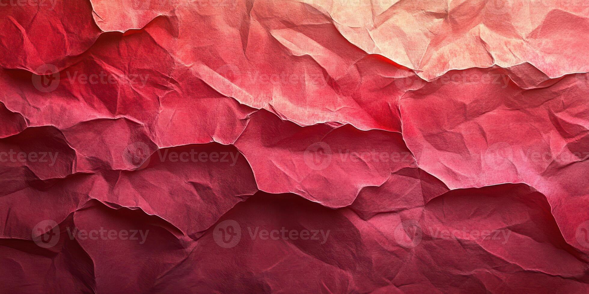Textured red paper displaying intricate folds and shadows in natural lighting creates a visually striking abstract background photo