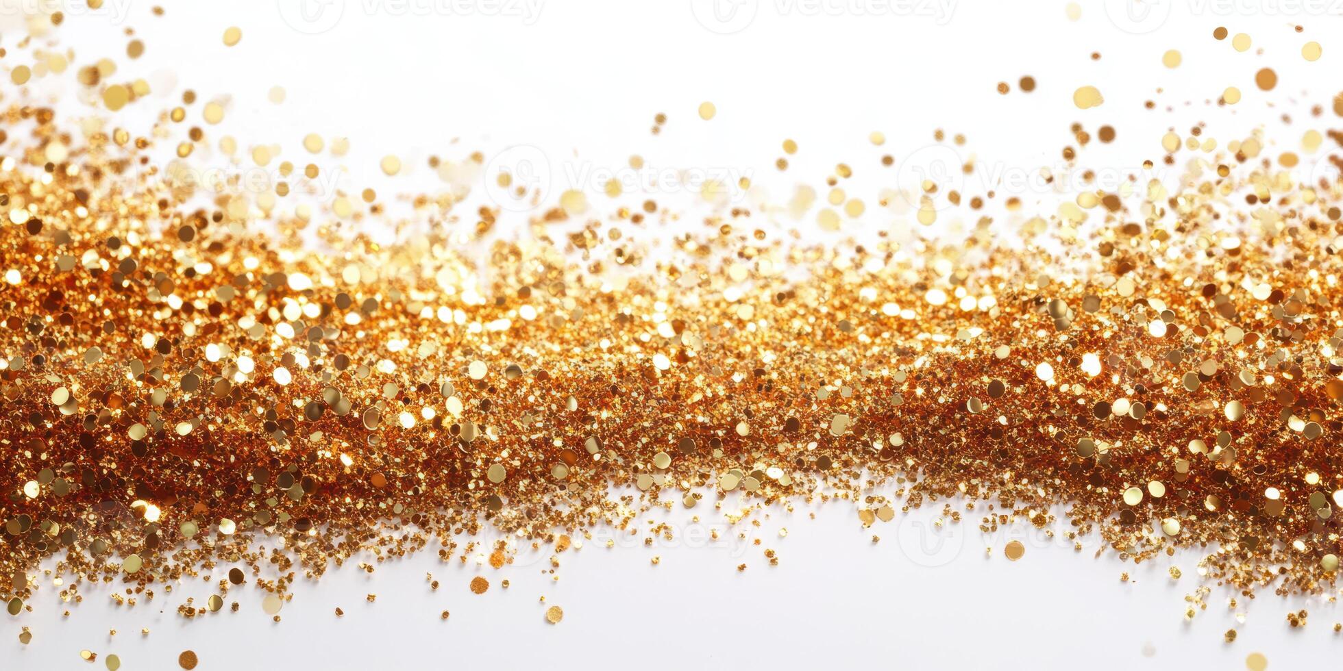 Golden glitter particles sparkle against a white background during a festive celebration or craft activity photo