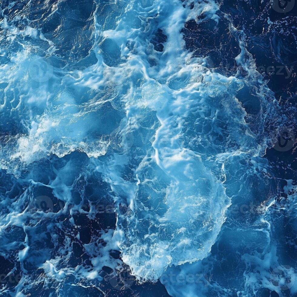 Aerial View of Turbulent Ocean Waves Over Head View photo