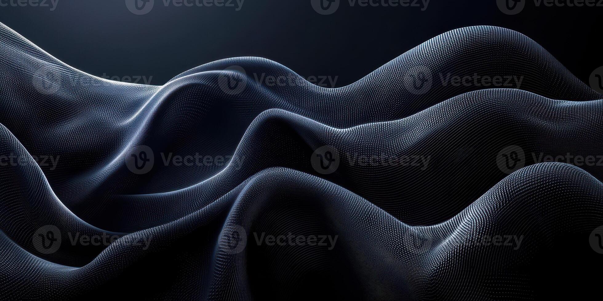 Textured waves of dark fabric create a dramatic abstract appearance in soft lighting photo
