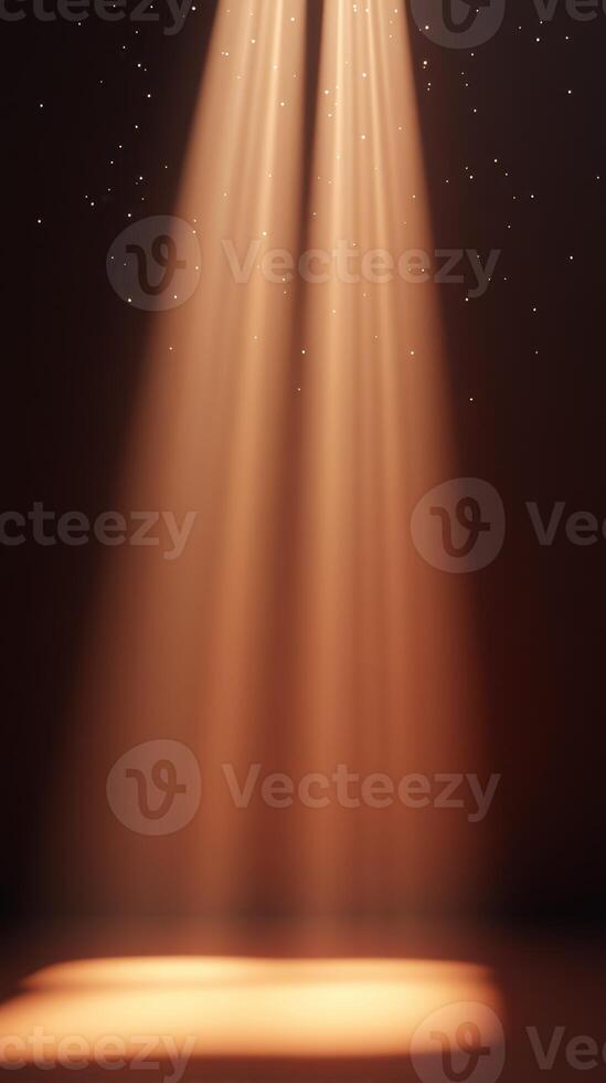 Soft golden light illuminates a stage with sparkling particles creating a magical atmosphere during an evening performance photo