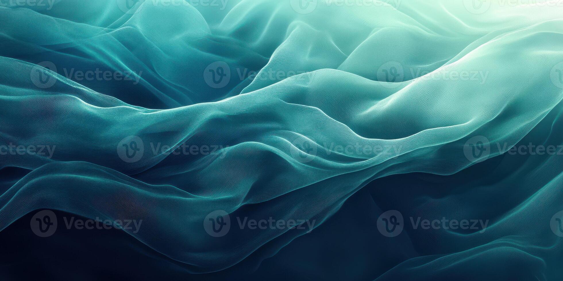 Fluid motion of soft fabric in shades of turquoise and teal creates a serene and calming atmosphere photo
