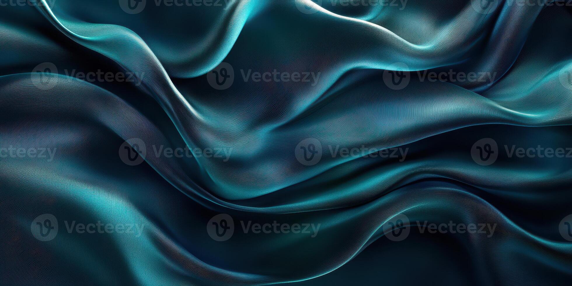 Elegant silk fabric draped gracefully in soft waves showcasing rich teal hues in a well-lit setting photo