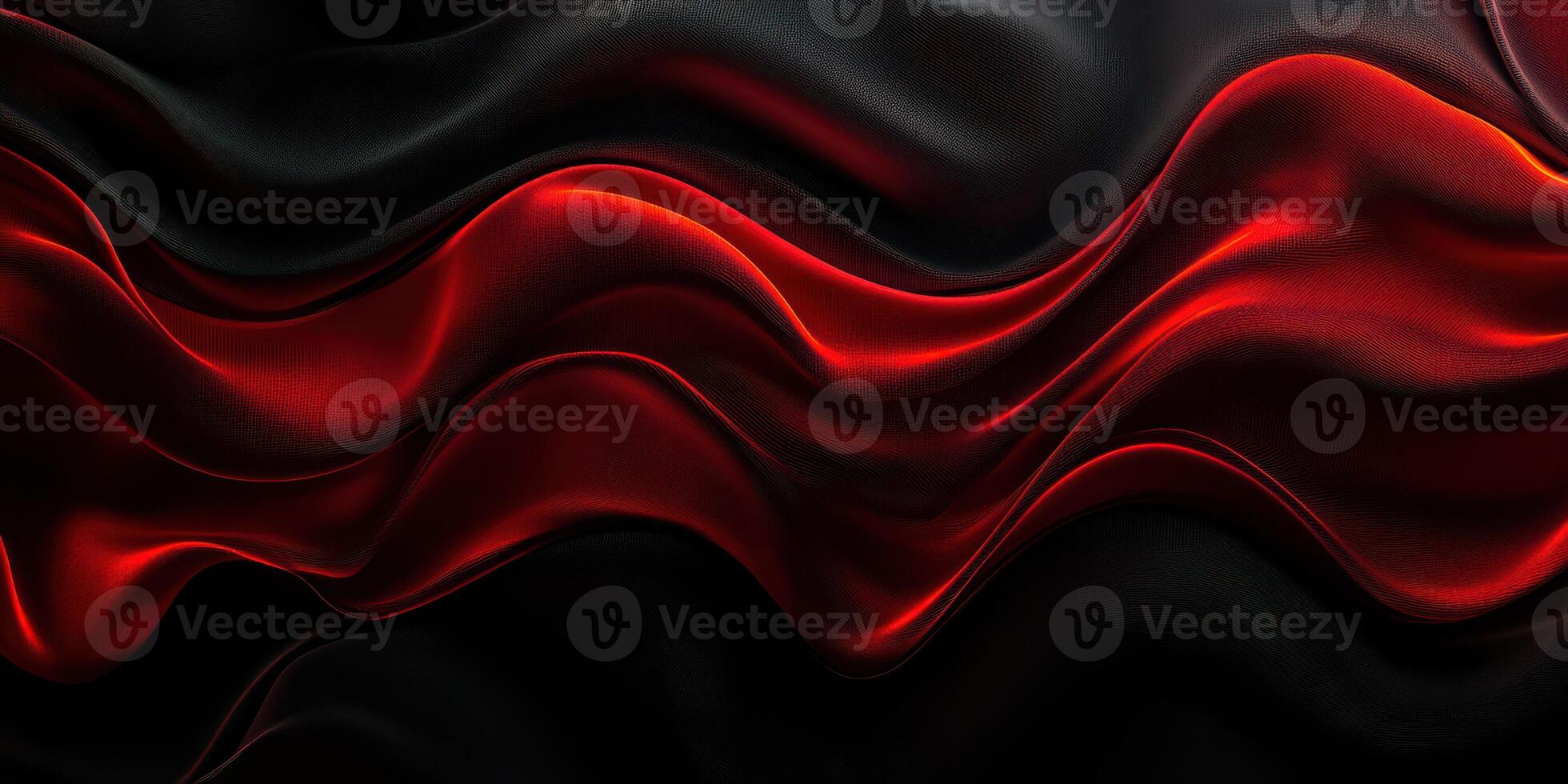 Textures of rich red and deep black satin fabric flowing together create an elegant display in soft curves at twilight photo