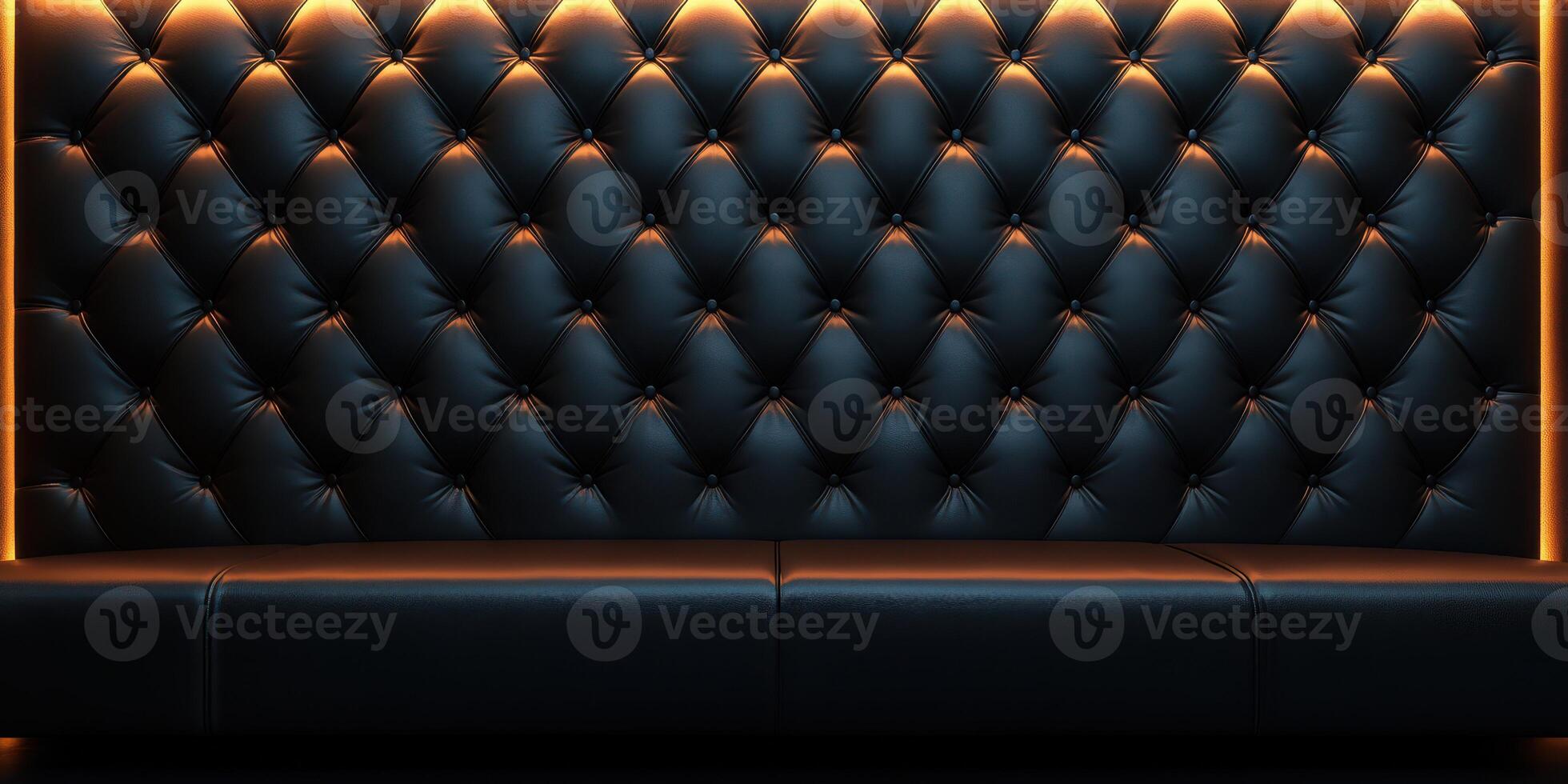 Elegant black leather couch with illuminated backdrop in modern interior setting at night photo