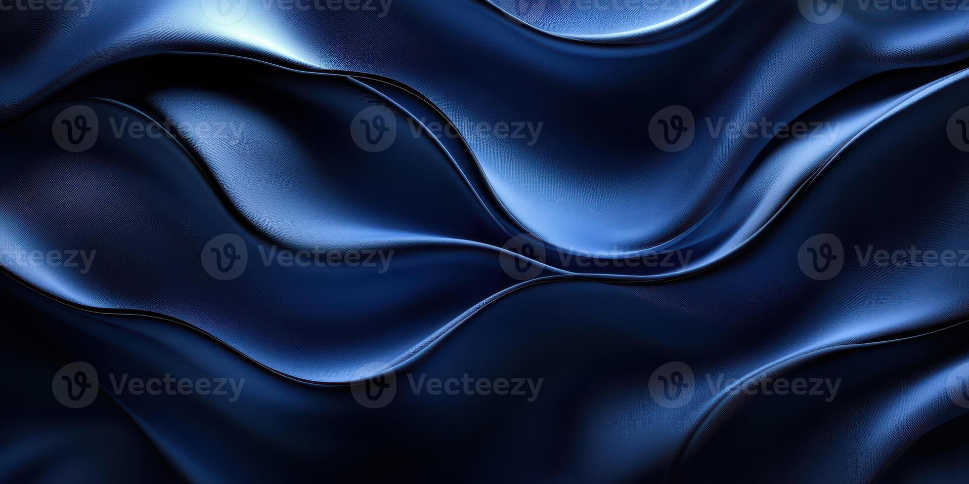 Elegant flowing fabric in deep blue tones showcases texture and movement captured in soft waves photo