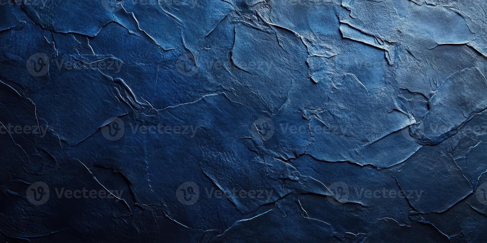 Textured dark blue wall with cracks and layers, creating a sophisticated atmosphere for modern designs photo