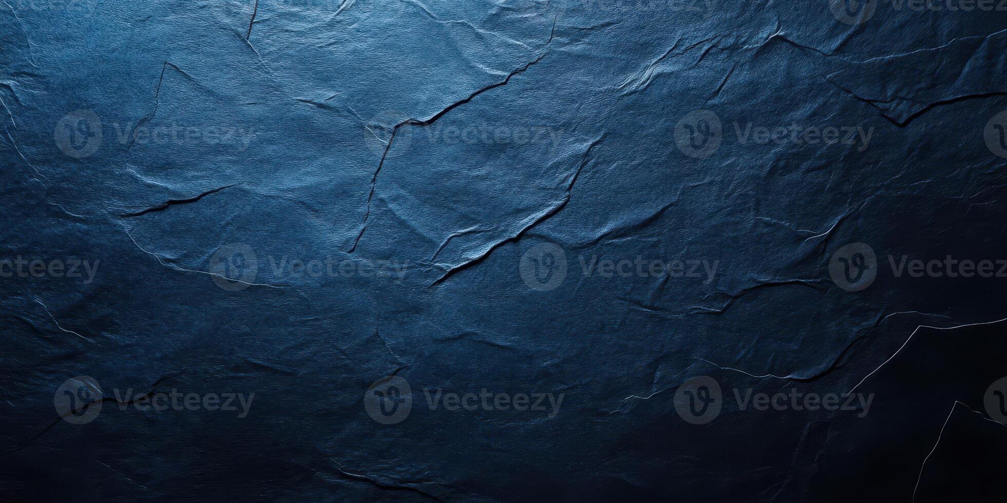 Dark textured surface with subtle creases and shadows creating an artistic backdrop for various applications photo