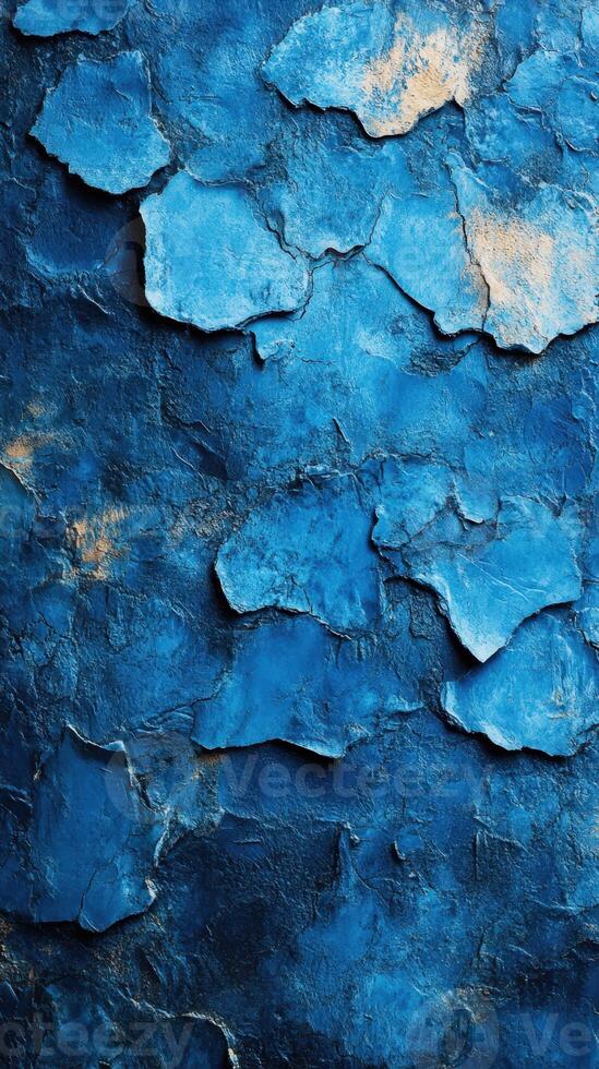 Vibrant blue textured surface showcasing unique layers and patterns found in urban art environments photo