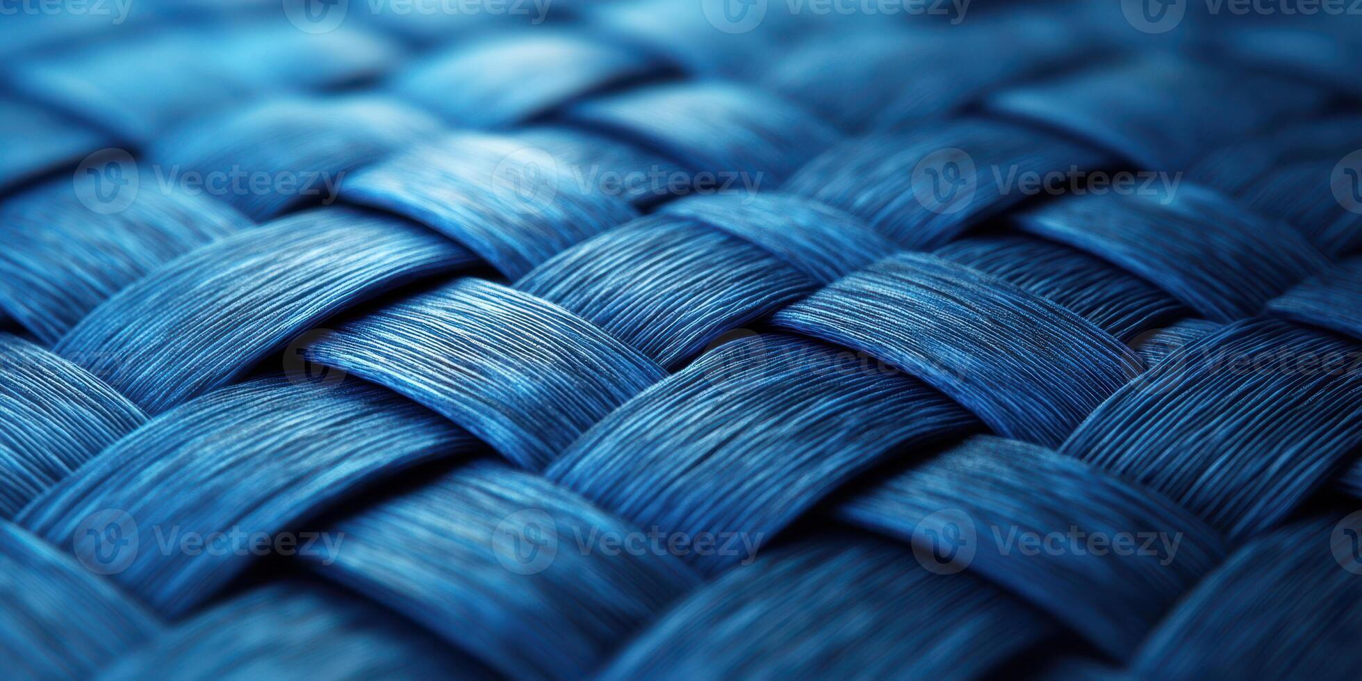 Detailed close-up of woven blue fabric showcasing intricate patterns and textures photo