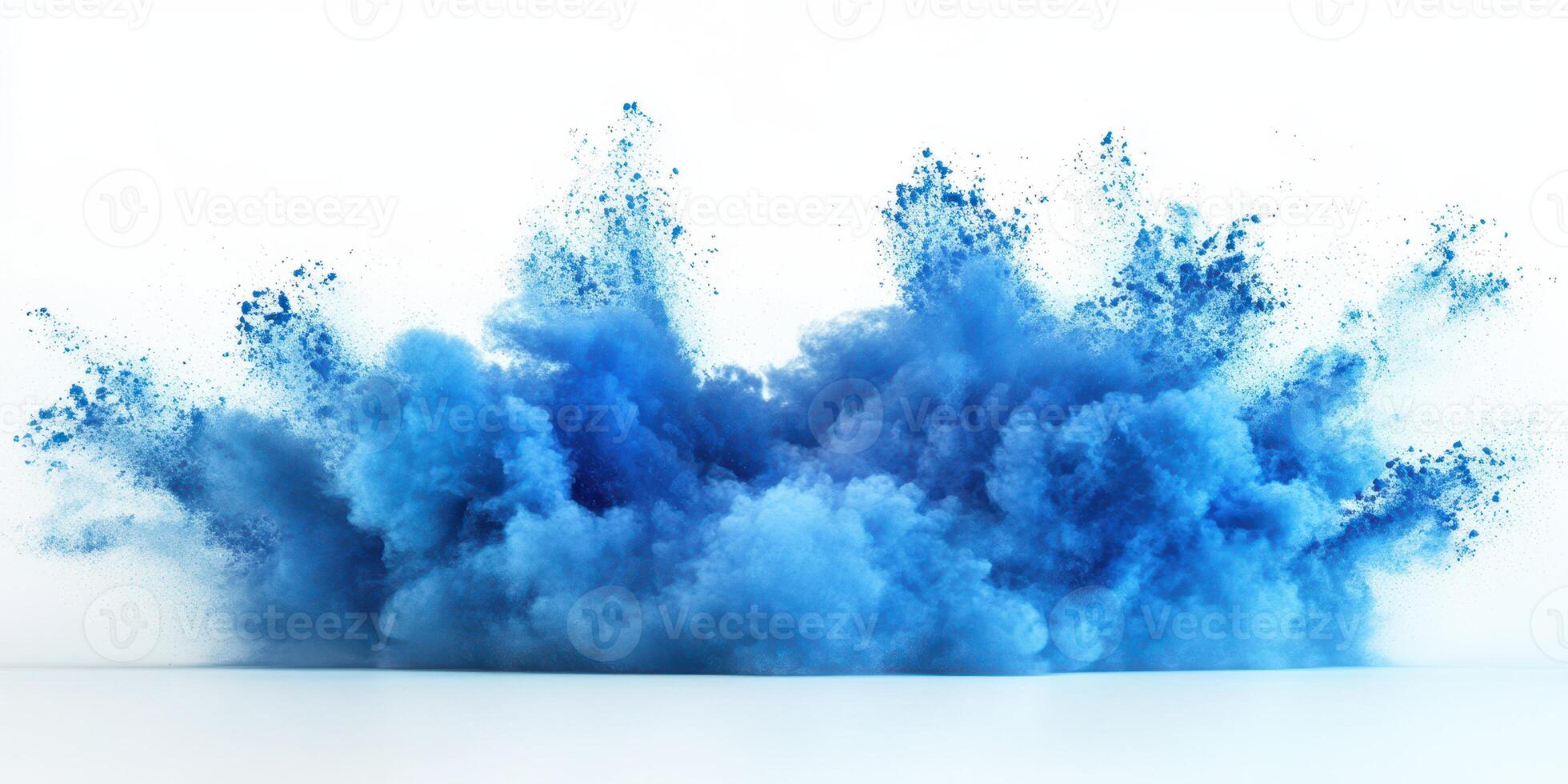 Vibrant blue powder explosion creates a stunning visual effect against a white background photo