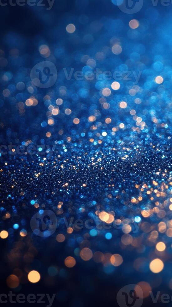 Shimmering blue and gold glitter creating a mesmerizing backdrop at an evening celebration photo