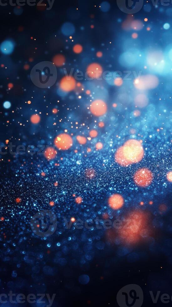 Colorful abstract background featuring shimmering particles and light effects in a deep blue and orange palette photo