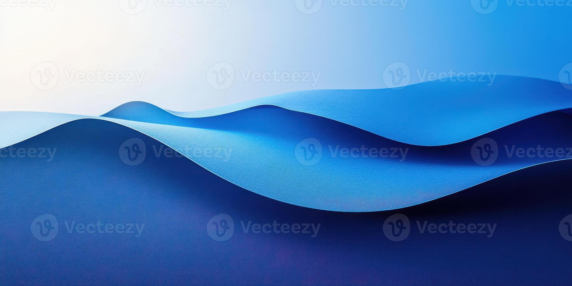 Waves of blue paper create a serene abstract composition in a minimalist style that evokes calmness and tranquility photo