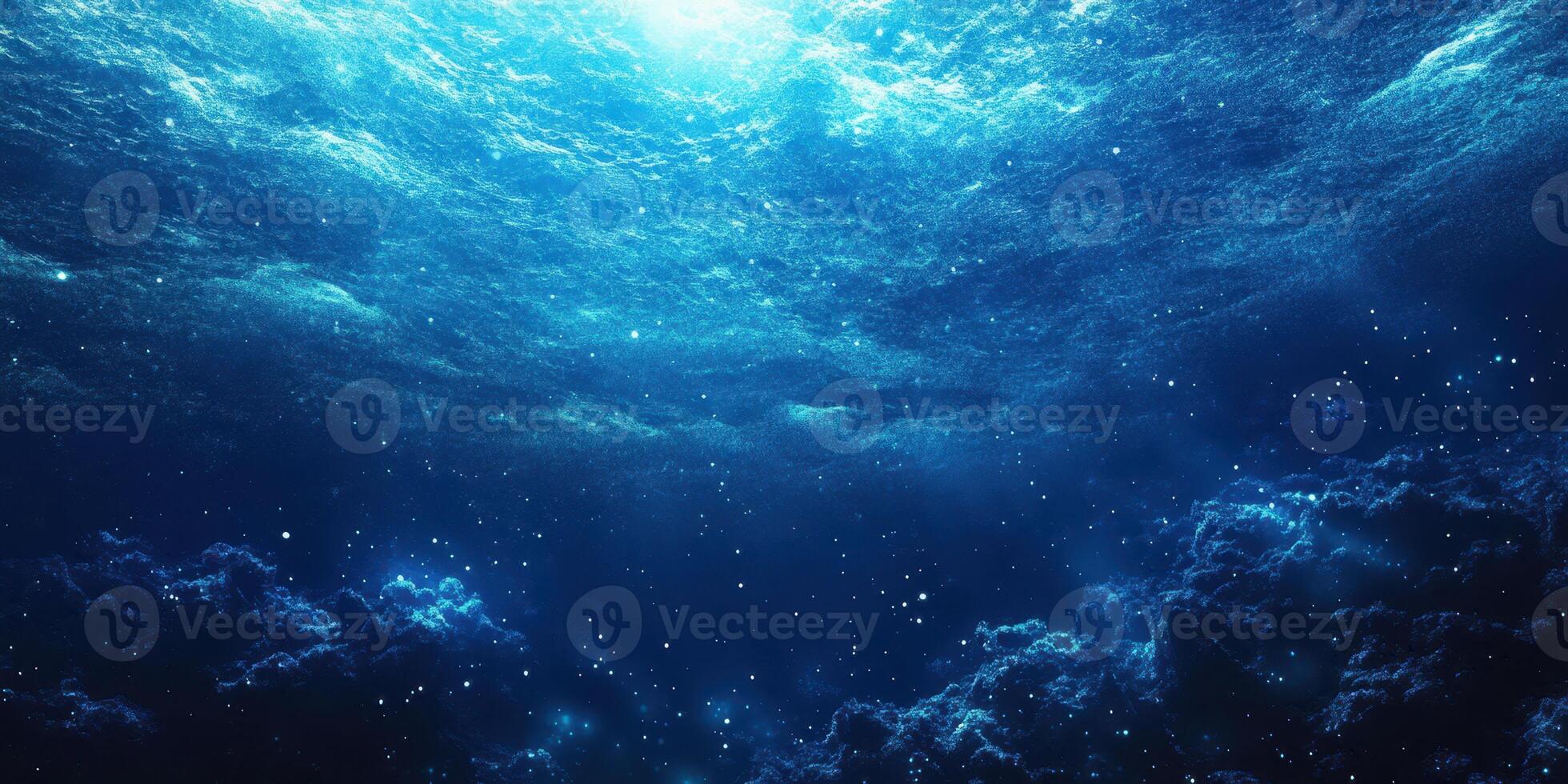 Mysterious underwater view showcasing the vibrant blue hues and swirling patterns of deep ocean currents in daylight photo