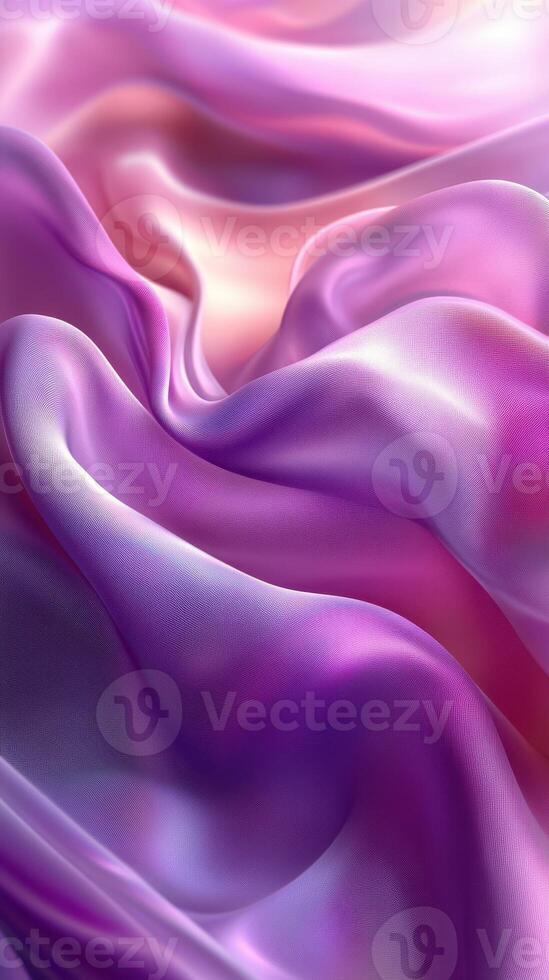 Beautiful flowing silk fabric in shades of purple and pink creating a mesmerizing texture and visual effect photo