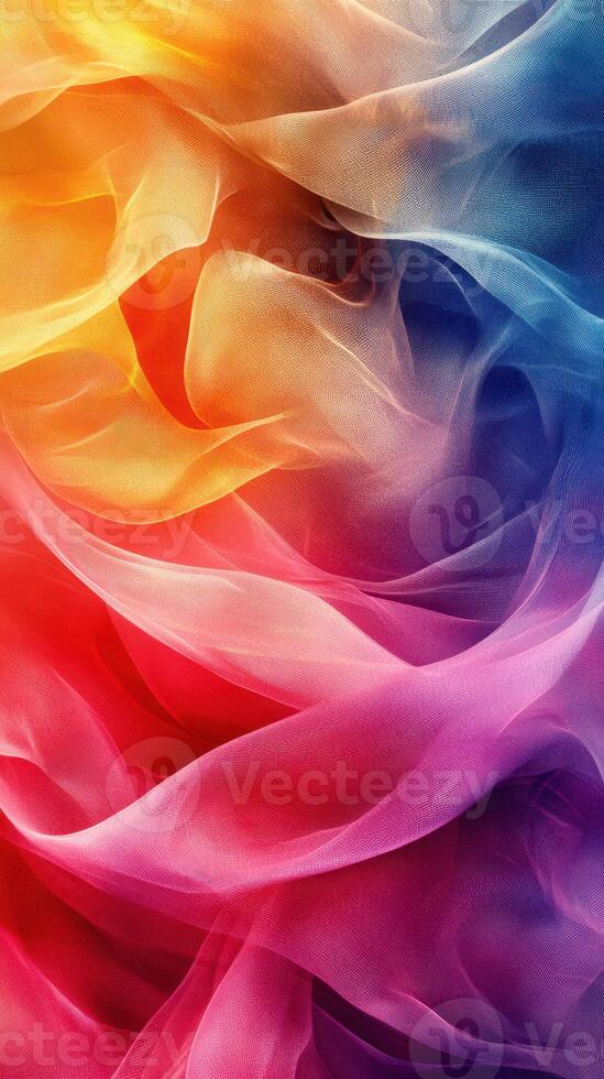 Colorful flowing fabric creates an abstract background with vibrant hues of orange, red, purple, and blue photo