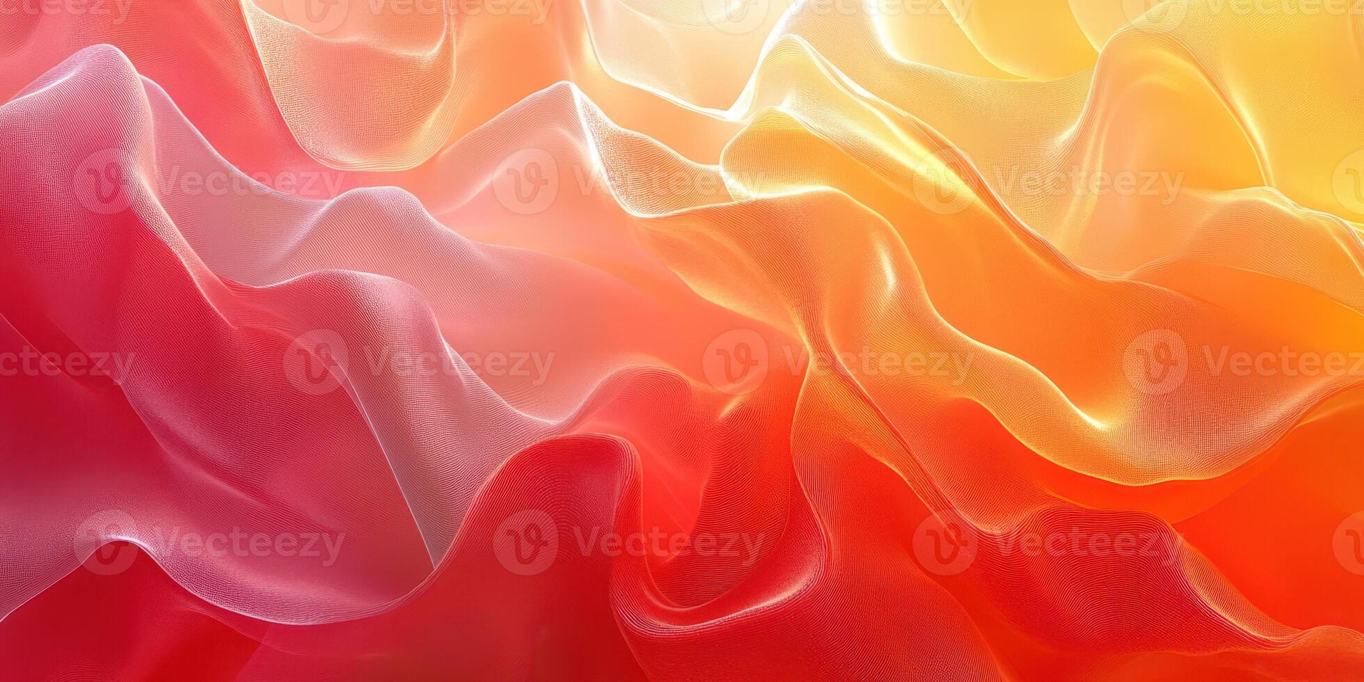 Colorful flowing fabric texture creating a sense of warmth and movement in vibrant hues of orange and pink photo