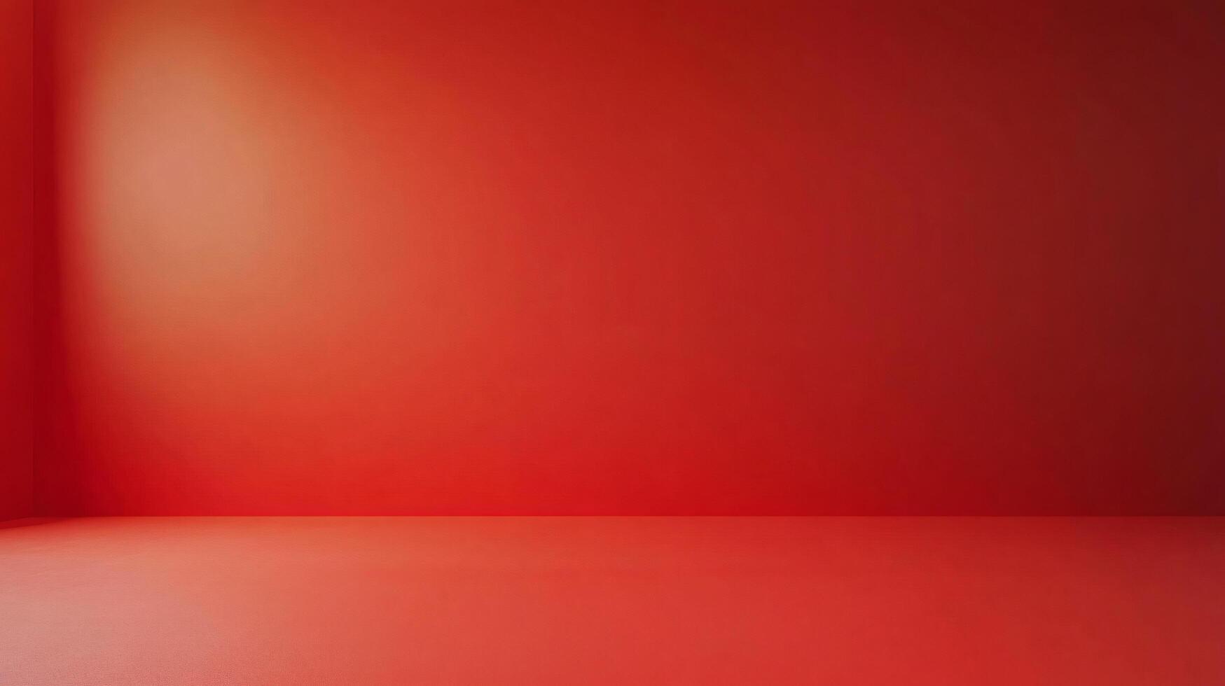 The room is a large, empty space with a red wall. The walls are bare and there is no furniture or decoration. The room has a minimalist feel to it, with the red wall serving as the only focal point photo